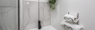 wash hand basin with hand towels.